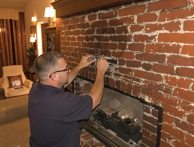 Miramar Chimney Sweep expert fixing a fireplace in Miramar, FL
